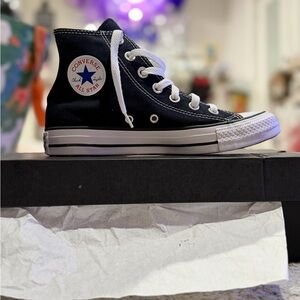 Converse Woman’s Black High-Top Sneakers